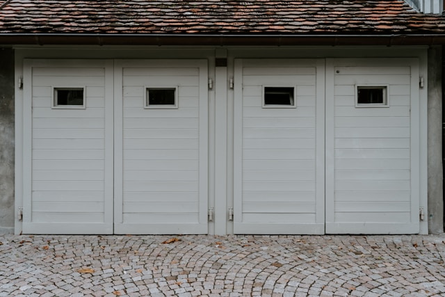 Garage Door Panel Replacement vs. Full Door Replacement: What’s More Cost-Effective?